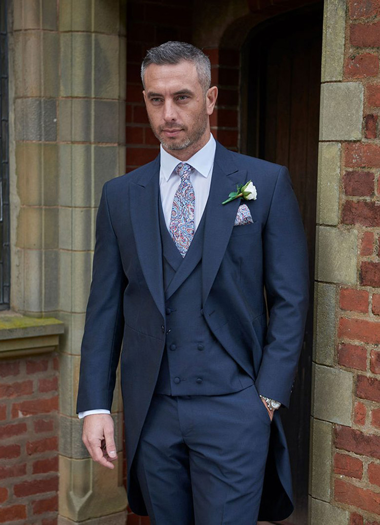 blue suit with check waistcoat